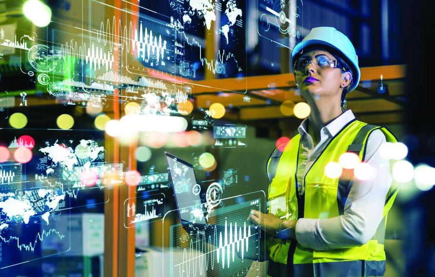 Woman in PPE surrounded by superimposed data